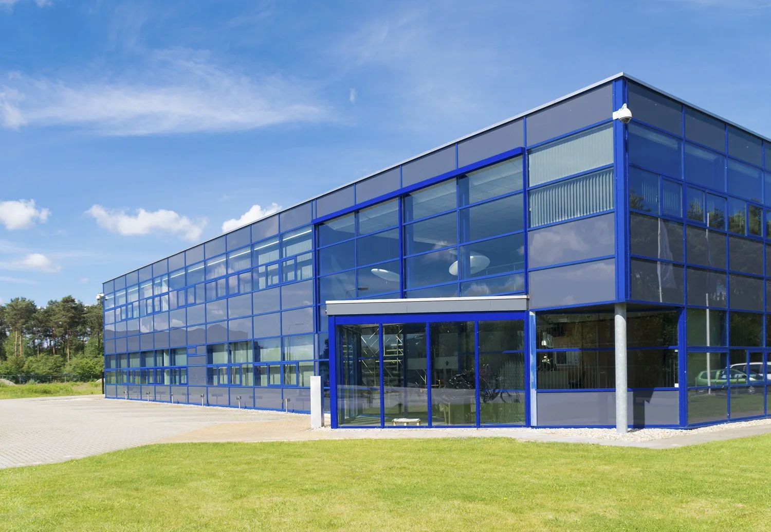 Low-rise commercial facility with broad glazed frontage